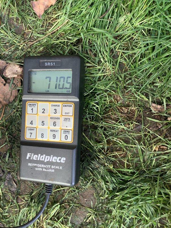 Responded to warranty call for outdoor AC unit that would not turn on. Upon arrival, performed diagnostic testing using digital manifold gauges to check refrigerant pressures and system temperatures. Identified failed capacitor as the root cause of the unit's failure to start. Replaced defective capacitor with new component and verified proper electrical connections. Tested system operation and confirmed outdoor unit now functions correctly. Measured and recorded refrigerant charge using calibrated scale, verifying system contains proper charge level of 710.5 ounces. System returned to normal operation with all components functioning as designed.