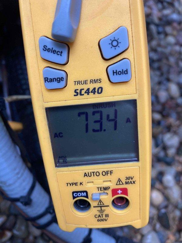 Completed prepaid AC maintenance tune-up on residential air conditioning system. Performed comprehensive system inspection including electrical panel assessment, verified proper amperage draw at 73.4 amps using calibrated multimeter, and documented equipment specifications showing 30-amp 240-volt AC unit model 83316. All components operating within normal parameters with routine maintenance tasks completed per manufacturer specifications.