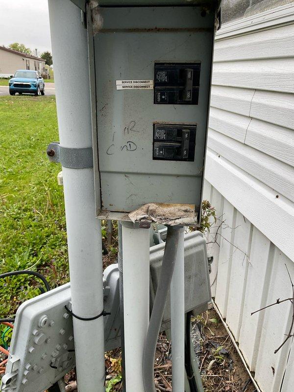 Conducted on-site assessment for HVAC system replacement, evaluating existing furnace and potential air conditioning unit for single or dual component estimate. Documented exterior electrical service panel configuration and interior mechanical space conditions, including existing utility line routing, structural framing, and equipment access points to determine installation requirements and specifications for proposed replacement system.