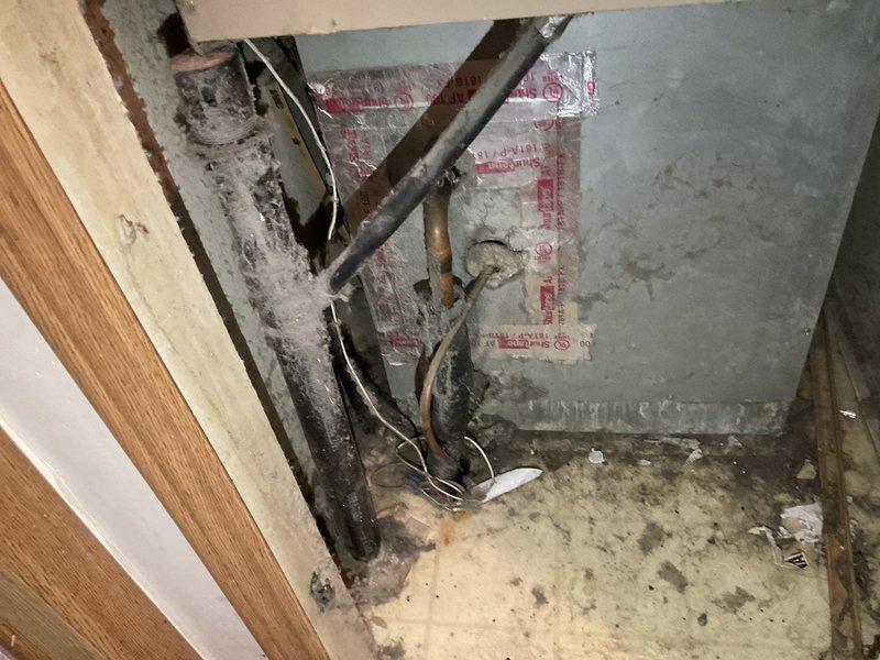 Conducted on-site assessment for HVAC system replacement, evaluating existing furnace and potential air conditioning unit for single or dual component estimate. Documented exterior electrical service panel configuration and interior mechanical space conditions, including existing utility line routing, structural framing, and equipment access points to determine installation requirements and specifications for proposed replacement system.