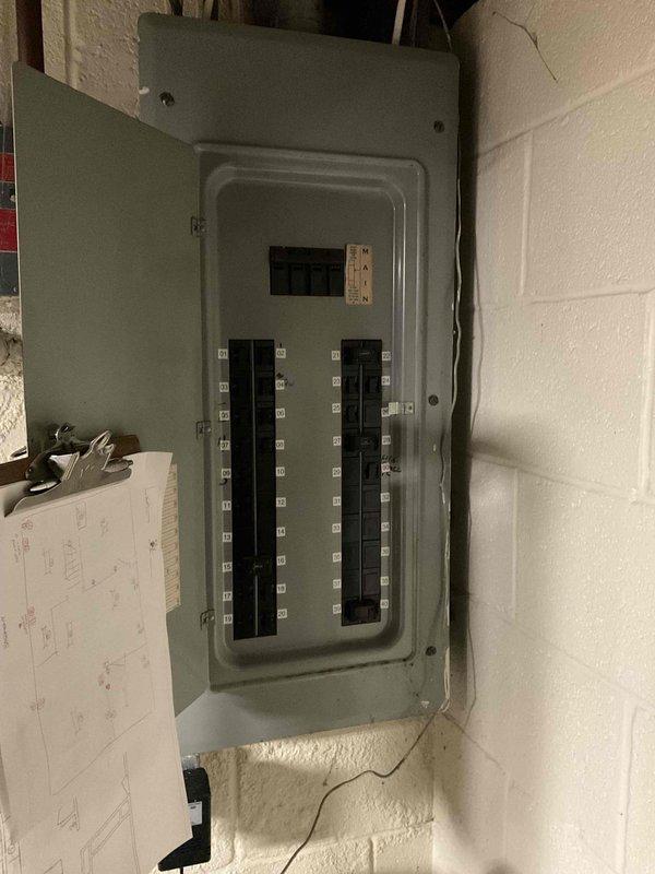 Completed comprehensive water heater replacement estimate for residential property. Assessed existing water heater installation including all supply and discharge plumbing connections, electrical panel capacity for new unit requirements, and proper venting configuration. Documented current system specifications, measured available clearances in mechanical room, and photographed electrical distribution panel to verify adequate circuit availability for replacement unit installation.