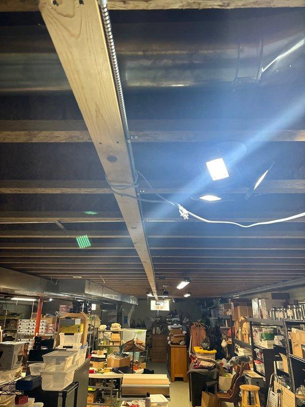 Completed electrical estimate for GFCI outlet installation in basement storage area. Assessed existing electrical infrastructure including exposed ceiling joists, conduit routing, and current outlet locations to determine optimal placement and circuit requirements for ground fault circuit interrupter protection. Documented site conditions and structural layout to prepare comprehensive material and labor estimate for code-compliant GFCI installation.