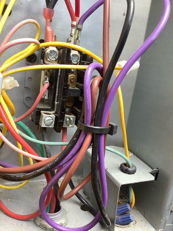 Completed scheduled CLUB AC 8-12 maintenance agreement visit on air conditioning system. Performed comprehensive inspection of electrical components including contactor assembly with multiple control circuits, verified proper wire connections and terminal integrity. Measured and recorded system amperage at 7.56 amps using clamp meter, indicating normal operating current for the unit. All electrical connections secure, refrigerant lines properly connected, and system operating within manufacturer specifications.