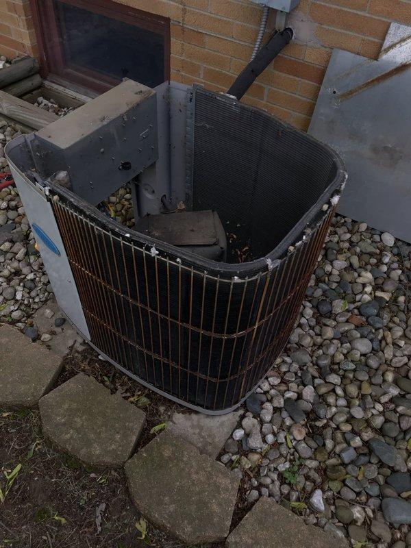 Completed preventive maintenance tune-up on residential air conditioning system. Performed comprehensive inspection of outdoor condenser unit, including removal of top panel to access internal components, verification of condenser coil condition, and documentation of unit specifications from manufacturer nameplate. All system components found operating within normal parameters.