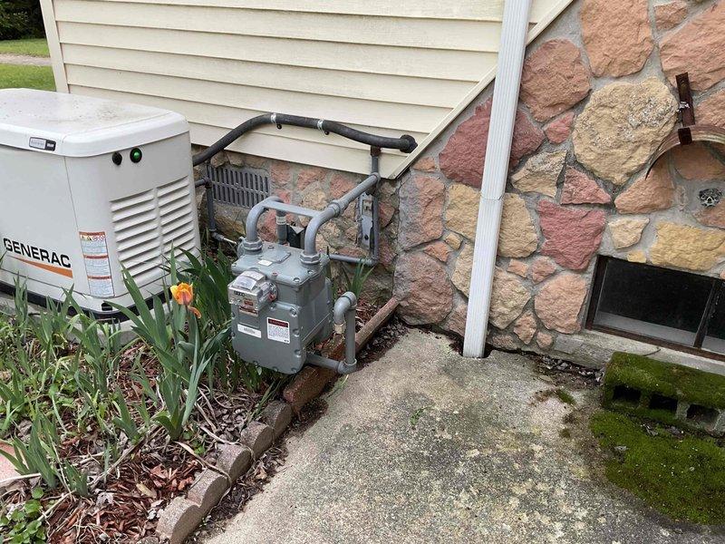 Completed on-site HVAC estimate for furnace replacement and full system replacement options at residential property. Assessed existing heating equipment, electrical panel capacity, and utility infrastructure including gas meter connections to provide multiple quote options for single component and complete system installations. Documented current equipment configuration and site conditions with detailed photography of outdoor utility area, generator placement, gas service, and interior electrical panel to support accurate equipment sizing and installation planning.