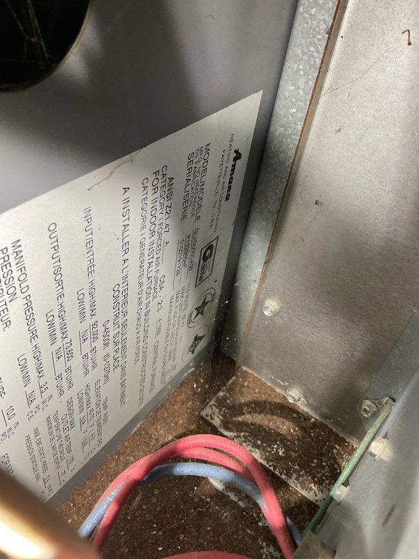 Responded to service call for non-functional air conditioning system that had exceeded its operational lifespan at over twenty years of age. Conducted comprehensive assessment of existing HVAC equipment, including inspection of air handler unit, ductwork configuration, and refrigerant line connections in mechanical space. Documented current system conditions through photographic evidence, capturing deteriorated components showing significant dust accumulation and age-related wear on metal surfaces and insulation materials. Evaluated attic installation area, noting existing flexible ductwork with insulation, vapor barrier materials, and structural framing to determine replacement feasibility and access requirements. Prepared two detailed replacement quotes (03665-01 and 03665-02) outlining equipment options and installation specifications for new air conditioning system to address complete system failure of aged unit.