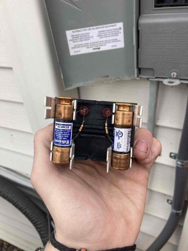 Completed preventive maintenance tune-up on mini-split air conditioning system and boiler heating system. Inspected outdoor condenser unit, verified proper operation of electrical components including fuse block assembly with Edison fuses, checked refrigerant lines and condensate drainage, and confirmed both systems are functioning within manufacturer specifications.