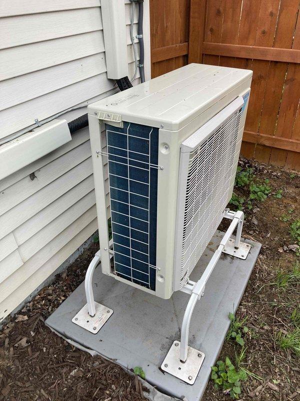 Completed preventive maintenance tune-up on mini-split air conditioning system and boiler heating system. Inspected outdoor condenser unit, verified proper operation of electrical components including fuse block assembly with Edison fuses, checked refrigerant lines and condensate drainage, and confirmed both systems are functioning within manufacturer specifications.