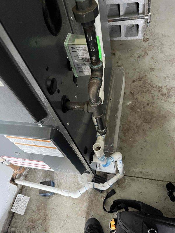 Completed Club AC maintenance agreement visit. Inspected HVAC system and identified low battery condition in thermostat. Provided customer instruction on proper battery replacement procedure for thermostat unit. Performed visual inspection of furnace, gas lines, condensate drainage system, and air handler components. All equipment operating within normal parameters. System ready for continued service.
