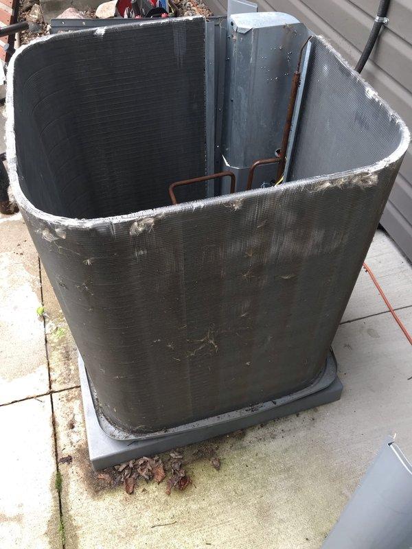 Completed callback service to address client concerns from previous maintenance visit. Inspected air filter assembly and identified obstruction issue causing difficulty with filter installation and removal. Thoroughly cleaned outdoor condenser coil which had been missed during initial service, removing accumulated dirt, debris, and organic matter from coil fins and exterior surfaces. Verified proper system operation and ensured all maintenance items were completed to customer satisfaction.