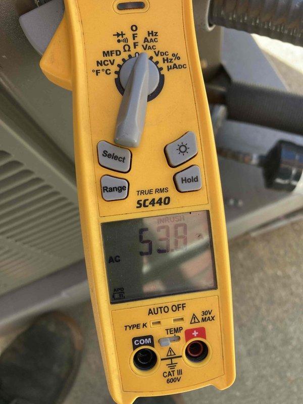 Completed prepaid AC maintenance tune-up as part of membership benefits. Performed comprehensive system inspection and testing using calibration-grade multimeter, measuring electrical parameters including voltage, amperage, and capacitance readings to verify proper system operation. All measurements fell within manufacturer specifications, confirming optimal performance of the air conditioning unit.