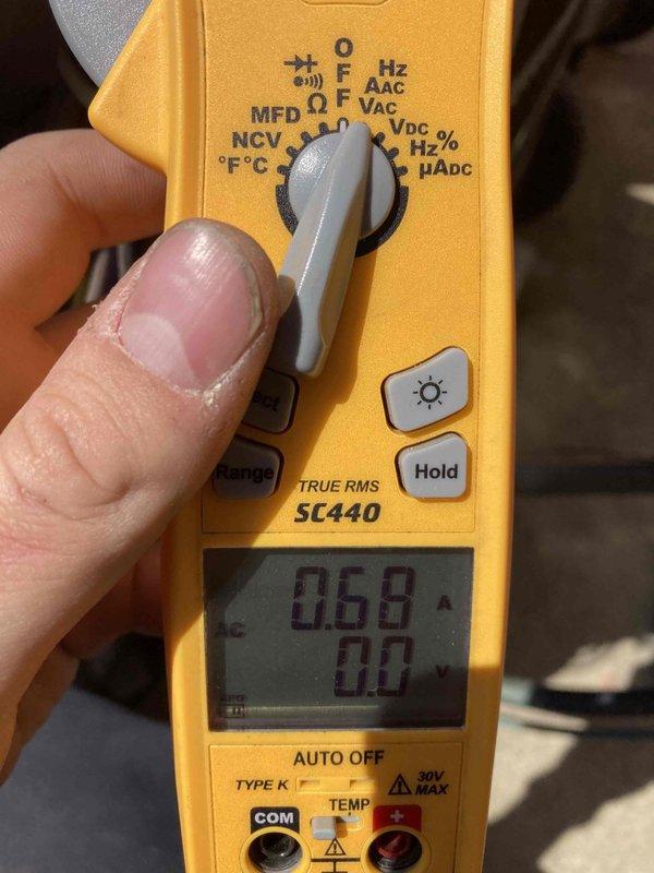 Completed prepaid AC maintenance tune-up as part of membership benefits. Performed comprehensive system inspection and testing using calibration-grade multimeter, measuring electrical parameters including voltage, amperage, and capacitance readings to verify proper system operation. All measurements fell within manufacturer specifications, confirming optimal performance of the air conditioning unit.