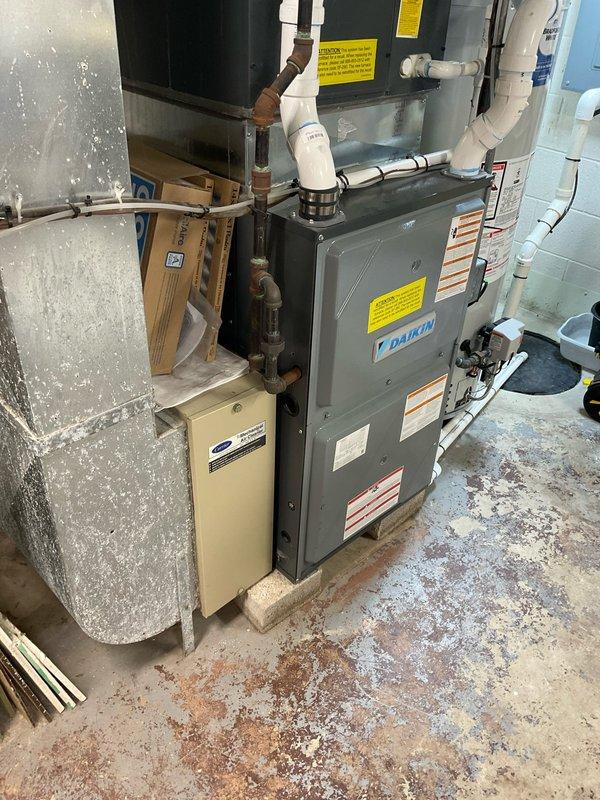 Conducted on-site evaluation for generator installation estimate at residential property with no existing backup power system. Assessed electrical infrastructure in basement utility room housing Daikin HVAC equipment to determine optimal generator placement, load requirements, and integration points for automatic transfer switch installation. Documented existing electrical panel configuration, main service capacity, and essential circuit loads including HVAC system, appliances, and critical home systems to develop comprehensive generator sizing recommendations and installation scope.
