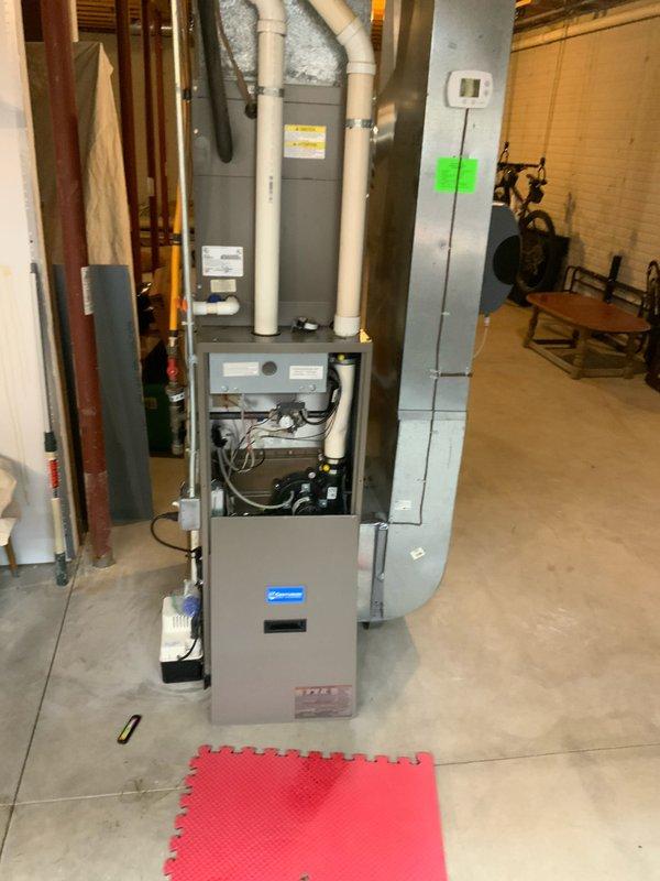 Completed scheduled CLUB AC 12-4 maintenance visit for indoor cooling system. Performed comprehensive inspection of furnace unit and associated components, verified proper operation of heating and cooling equipment, and documented system condition with photographic records showing accessible mechanical components, electrical connections, and safety labeling intact.