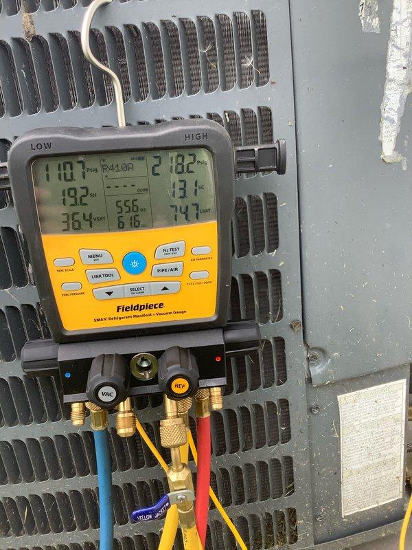 Completed preventive maintenance agreement visit on air conditioning system. Connected manifold gauges to service ports and recorded operating pressures and temperatures for R-410A refrigerant system, verifying proper charge and system performance with superheat and subcooling measurements within acceptable parameters. Measured compressor amperage draw at 7.12 amps using clamp meter, confirming electrical operation within manufacturer specifications.