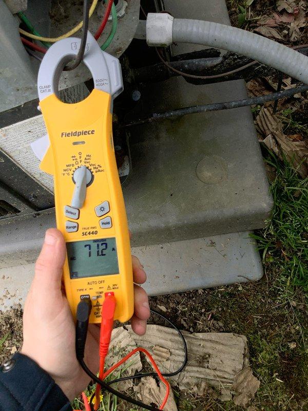 Completed preventive maintenance agreement visit on air conditioning system. Connected manifold gauges to service ports and recorded operating pressures and temperatures for R-410A refrigerant system, verifying proper charge and system performance with superheat and subcooling measurements within acceptable parameters. Measured compressor amperage draw at 7.12 amps using clamp meter, confirming electrical operation within manufacturer specifications.