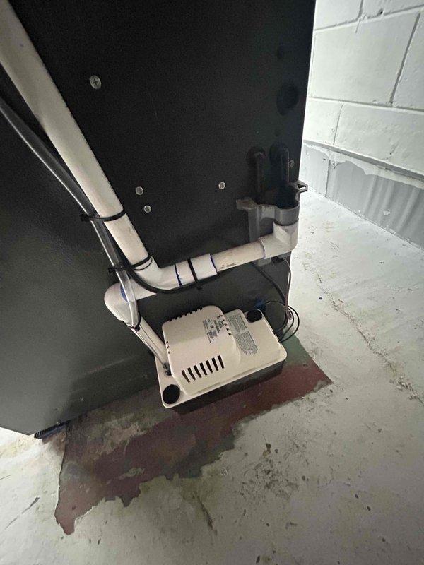 Successfully completed installation of 2.5 ton air conditioning system with evaporator coil. Installed new Goodman AC unit with rear discharge configuration, mounted and secured evaporator coil to existing furnace system. Completed all mechanical connections including refrigerant lines, electrical wiring to breaker panel, and condensate drainage system with pump installation. Verified proper system operation, refrigerant charge, and airflow. All components tested and functioning within manufacturer specifications.