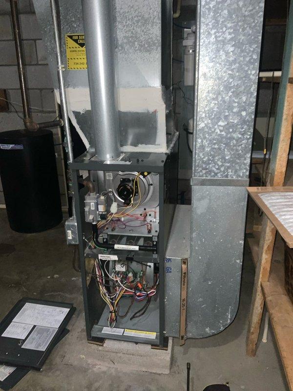 Completed routine maintenance inspection on residential HVAC furnace unit as part of Club AC8-12 agreement. Performed comprehensive system evaluation including visual inspection of all accessible components, blower motor assembly, electrical connections, and ductwork. Documented equipment specifications and current operating condition through photographic records for maintenance history files.
