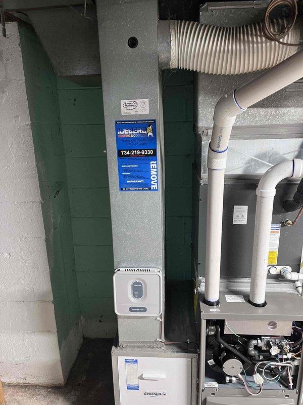 Completed warranty furnace replacement at residential property. Removed existing failed unit and installed new furnace system in basement mechanical room, including proper ductwork connections to existing green supply chase and integration with GeneralAire humidifier. Verified all gas line connections, condensate drainage via PVC piping, electrical wiring, and venting systems are properly installed and functioning to manufacturer specifications. System tested and operational.