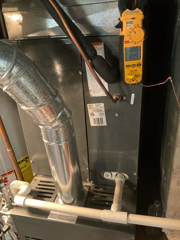 Completed scheduled AC Club maintenance visit on Goodman R9X130610A cooling system. Performed comprehensive inspection of indoor air handler unit and outdoor condensing unit, including electrical testing with digital multimeter to verify proper voltage and amperage readings. Inspected refrigerant lines, condensate drainage system, and ductwork connections for proper operation and signs of wear. All components found to be functioning within normal parameters with no immediate service needs identified.