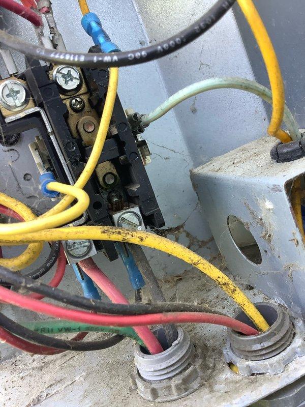 Completed preventative maintenance agreement visit for Club AC8-12 service on residential air conditioning system. Performed comprehensive electrical diagnostics using clamp meter, recording amperage reading of 76.5 amps at outdoor condensing unit. Inspected all electrical connections at terminal block, verified proper wire routing and connections including line voltage wiring and low voltage control circuits. Examined capacitor condition and mounting hardware, noting normal operational wear. All electrical components functioning within manufacturer specifications. System operational upon completion of maintenance visit.