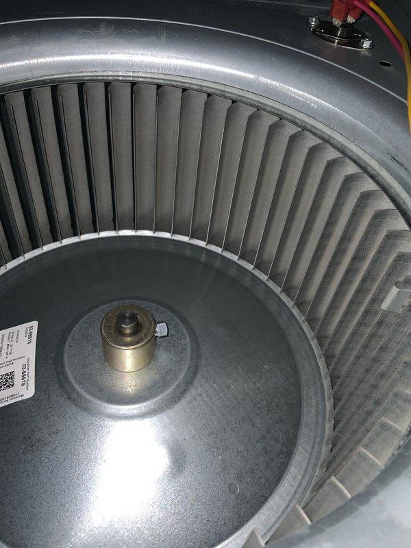 Responded to service call for lack of cooling reported at end of previous season. Upon arrival, performed comprehensive inspection of air handler unit and evaporator coil assembly. Accessed interior components through service panel and conducted visual examination of blower assembly, evaporator coil, and refrigerant lines. Inspected squirrel cage blower wheel, which showed clean condition with minimal debris accumulation. Verified blower motor shaft coupling and electrical connections at terminal blocks were secure and properly configured. Examined evaporator coil assembly with multiple rows of aluminum fins and U-shaped refrigerant tubes for any signs of damage, blockage, or refrigerant leaks. All coil fins appeared intact with proper spacing. Checked reflective insulation material lining interior housing for deterioration. Documented system components and current condition with photographs for service records.