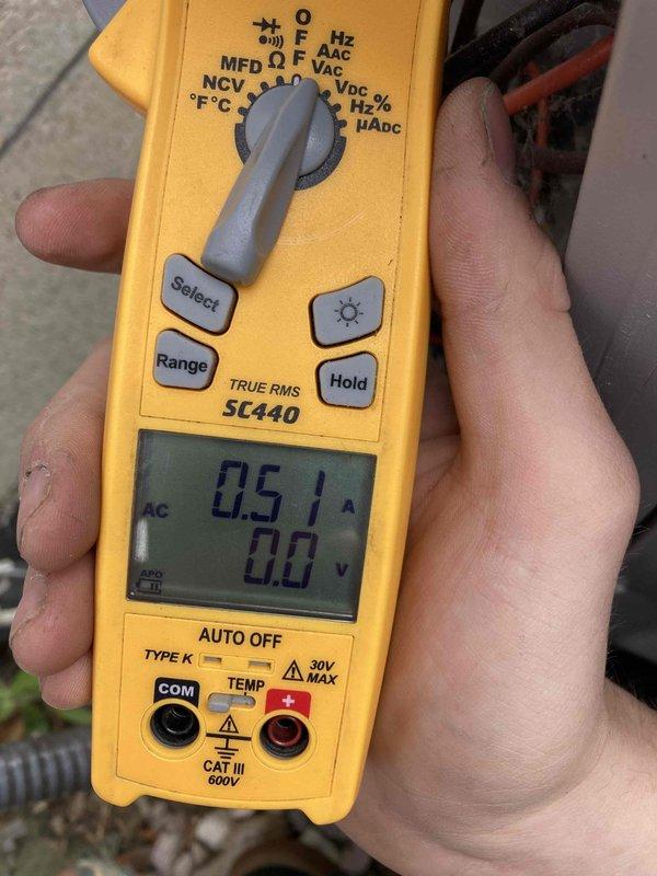 Completed Club AC8-12 preventive maintenance agreement visit on air conditioning system. Performed comprehensive inspection of air handler components including blower motor assembly and electrical connections. Verified proper amperage draw at 0.5 amps using calibrated Fluke SC440 True RMS clamp meter, confirming motor operating within normal parameters. Inspected all electrical wiring connections including red, blue, orange, and yellow motor leads for secure terminations and proper routing. Checked voltage readings and confirmed system electrical integrity. Examined blower motor mounting, shaft alignment, and cabinet insulation condition. All components found operating properly with no deficiencies noted. System running efficiently per manufacturer specifications.