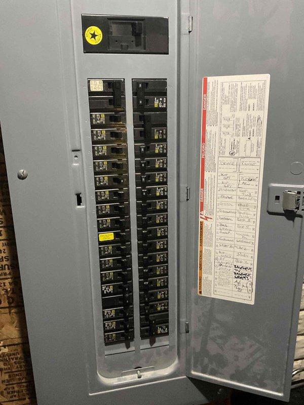 Completed on-site evaluation for HVAC system replacement estimate at residential property. Assessed existing furnace/air handler unit located in basement utility area, documented electrical panel configuration and circuit capacity for new equipment installation requirements, and photographed current system setup including supply piping, condensate drainage, and available clearances for replacement unit sizing.