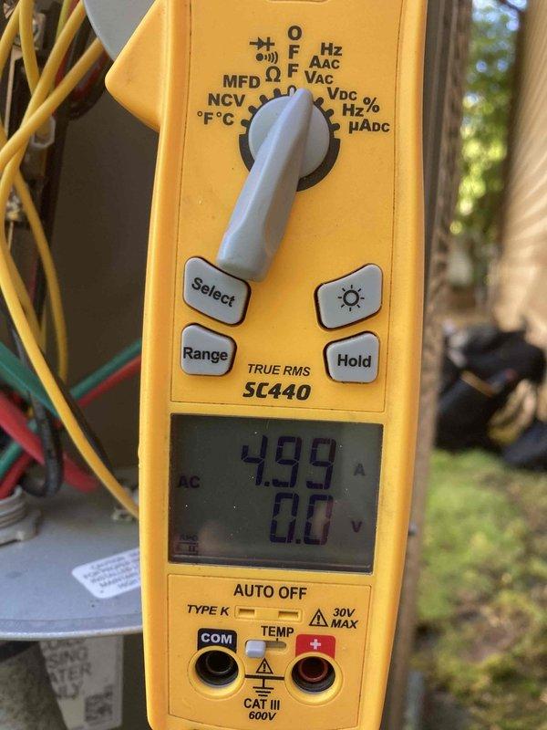 Completed routine preventive maintenance agreement visit for Club AC8-12 service on residential air conditioning system. Performed comprehensive inspection of air handler unit, including blower assembly, refrigerant lines, and electrical connections. Verified system amperage draw at 4.99A using calibrated clamp meter, confirming proper electrical operation within manufacturer specifications. All components found operating normally with no deficiencies noted.