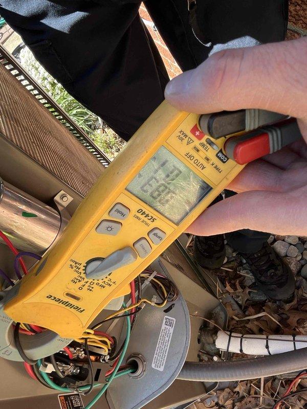 Performed comprehensive preventive maintenance on 3-year-old air conditioning system as part of agreement visit. Conducted electrical diagnostics using multimeter to verify motor amperage and system performance, confirming all readings within manufacturer specifications. Inspected blower motor, wiring connections, and internal components; system operating properly with no issues identified.