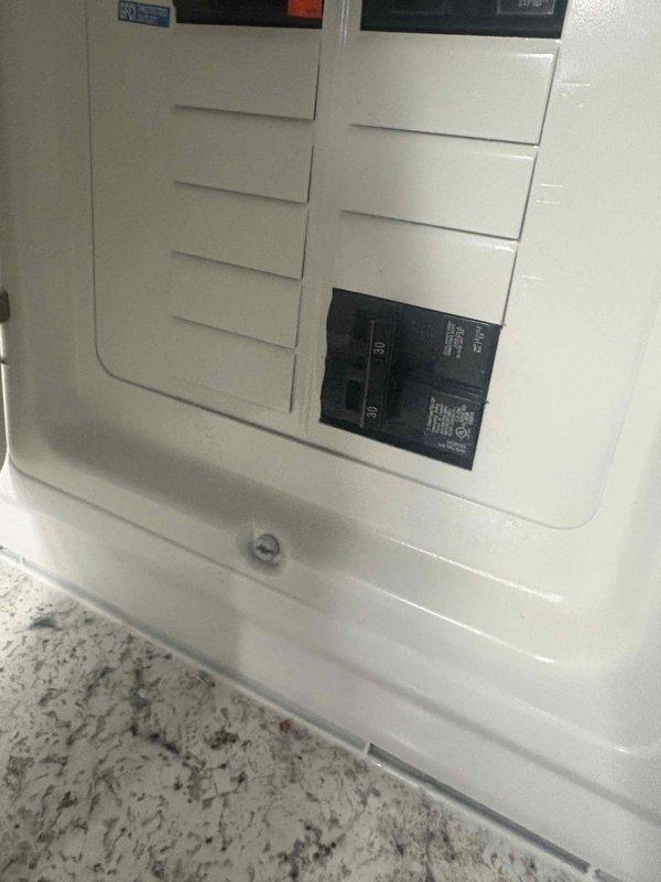 Completed electrical installation for mini split HVAC system by installing dedicated circuit breaker in existing residential electrical panel. Installed new circuit breaker in available slot, properly labeled and integrated into panel's two-column breaker configuration. Verified proper electrical connections, tested circuit functionality, and ensured all work met code requirements for mini split system operation.