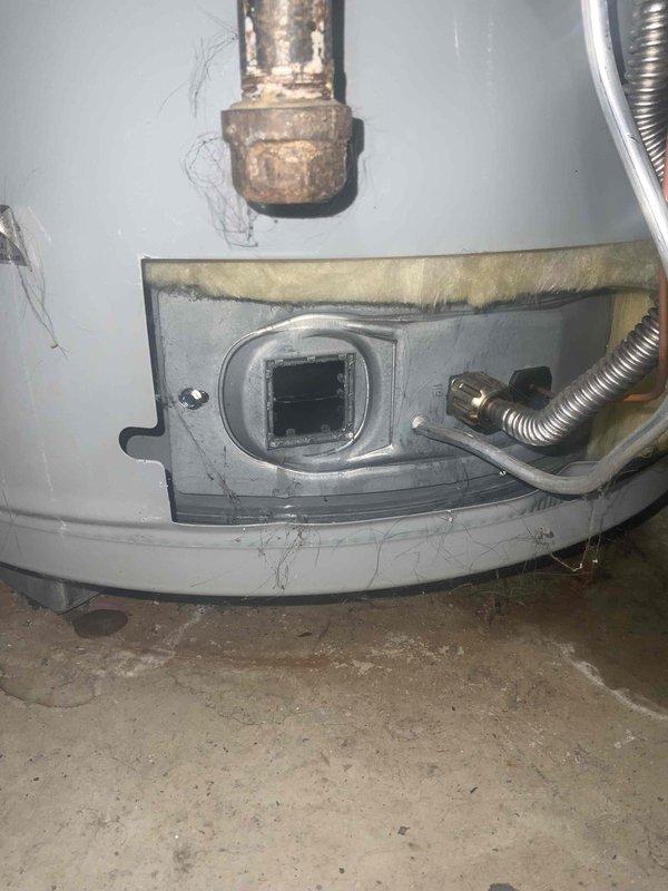 Responded to service call for water heater failure to ignite. Upon arrival, inspected PowerFlex water heater unit and observed significant corrosion on copper supply piping, indicating advanced age and deterioration of system components. Performed diagnostic testing on ignition system, pilot assembly, and gas valve operation. Identified ignition failure and completed necessary repairs to restore proper water heater function. Verified unit successfully lights and maintains flame, with all safety controls operating within manufacturer specifications. System returned to normal operation with hot water production confirmed.