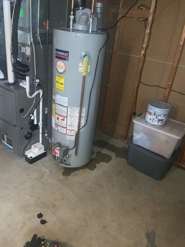 Responded to service call for water heater failure to ignite. Upon arrival, inspected PowerFlex water heater unit and observed significant corrosion on copper supply piping, indicating advanced age and deterioration of system components. Performed diagnostic testing on ignition system, pilot assembly, and gas valve operation. Identified ignition failure and completed necessary repairs to restore proper water heater function. Verified unit successfully lights and maintains flame, with all safety controls operating within manufacturer specifications. System returned to normal operation with hot water production confirmed.