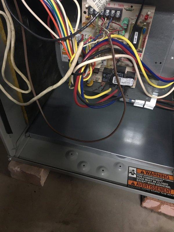 Completed preventive maintenance tune-up on residential furnace and air conditioning system. Inspected electrical components, wiring connections, and control board within unit; verified proper operation of contactors and safety controls. All components found to be in satisfactory working condition with no immediate repairs required.