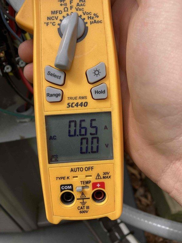 Completed preventive maintenance inspection on air conditioning system as part of club AC10-2 agreement visit. Performed electrical diagnostics using digital multimeter, measuring amperage draw of 0.65A and conducting voltage tests throughout the system. Inspected and tested all electrical components including capacitor and control wiring connections to verify proper operation and system performance.