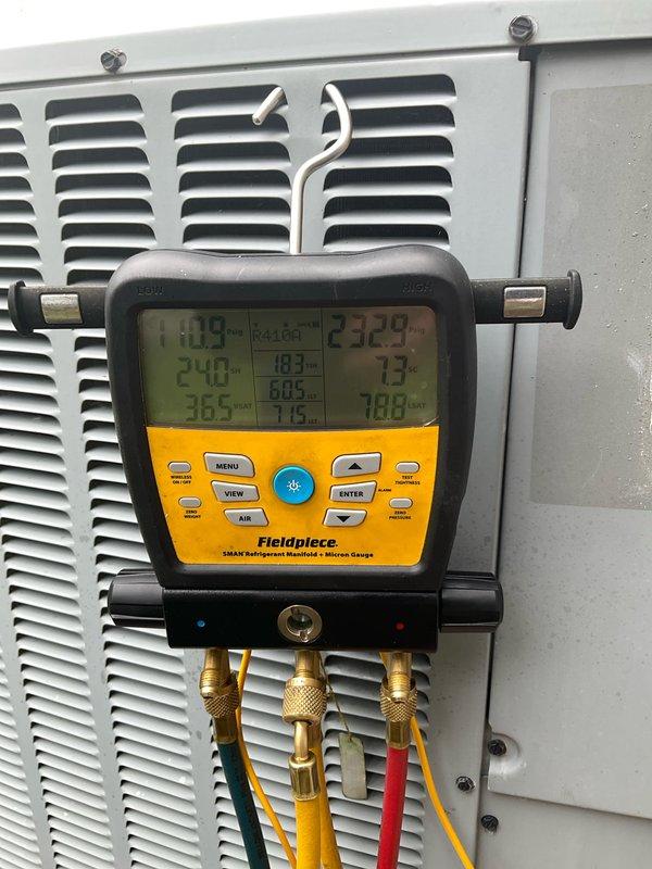 Completed preventive maintenance agreement visit on residential air conditioning system. Performed system diagnostics using refrigerant manifold gauges to verify proper operating pressures and temperatures across the unit. Accessed electrical compartment to inspect wiring connections, capacitor, and control components for proper operation and secure connections. All measurements within manufacturer specifications and system operating normally.