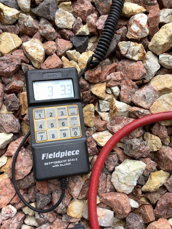 # HVAC Service Report

Responded to no cooling complaint on 10-year-old residential air conditioning system. Upon arrival, performed comprehensive system diagnostics using digital manifold gauges to assess refrigerant pressures and system performance. Testing revealed low refrigerant charge in the R-410A system. Connected refrigerant recovery and charging equipment, including calibrated digital scale with alarm functionality, to accurately measure and add refrigerant to manufacturer specifications. Verified proper system operation, pressures, and cooling performance upon completion. System restored to normal cooling operation.