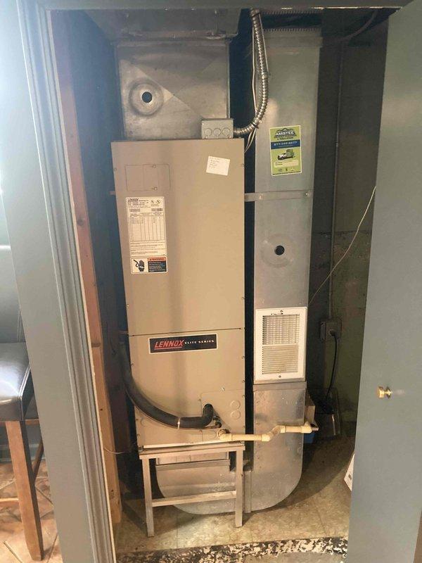Responded to no cooling complaint on aging residential HVAC system. Upon inspection, found condenser fan motor in severely deteriorated condition with extensive corrosion on copper windings, compromised electrical connections, and heavy debris accumulation preventing proper operation. Motor assembly showed signs of long-term environmental exposure and lack of maintenance, resulting in complete failure and loss of cooling capacity. Documented equipment condition and recommended system evaluation due to age and overall deterioration of components.