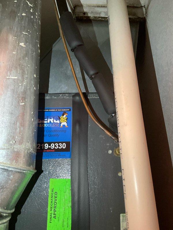 Completed comprehensive HVAC system replacement estimate for residential property, documenting existing Goodman furnace installation in utility closet and associated ductwork infrastructure in attic space. Assessment included evaluation of galvanized metal supply duct, flexible return duct with metal strapping support, PVC condensate drainage system, and overall mechanical system configuration to provide accurate replacement specifications and equipment recommendations.