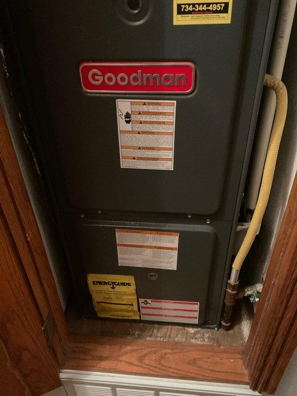 Completed comprehensive HVAC system replacement estimate for residential property, documenting existing Goodman furnace installation in utility closet and associated ductwork infrastructure in attic space. Assessment included evaluation of galvanized metal supply duct, flexible return duct with metal strapping support, PVC condensate drainage system, and overall mechanical system configuration to provide accurate replacement specifications and equipment recommendations.