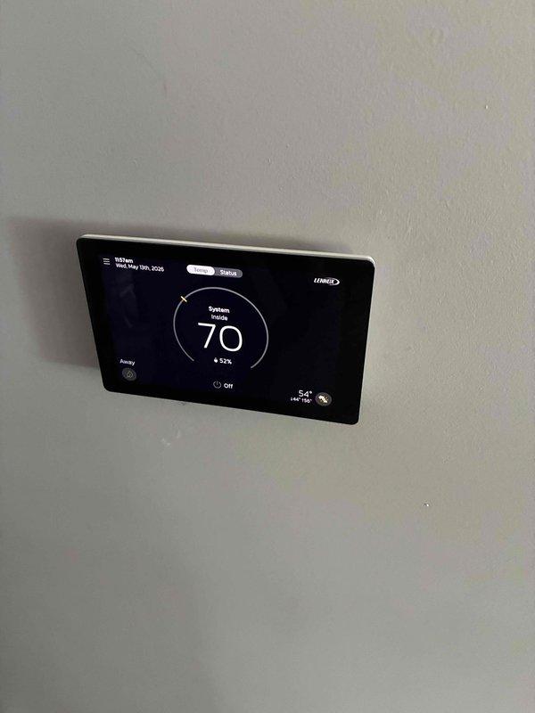 Completed full HVAC system installation including a 90,000 BTU furnace and 3-ton air conditioning unit positioned on the left side of the property. Performed all mechanical and electrical connections, installed PVC venting system, and reconnected existing hot water heater. Installed Lennox programmable thermostat with digital display and verified all equipment operational with proper temperature control and system functionality.