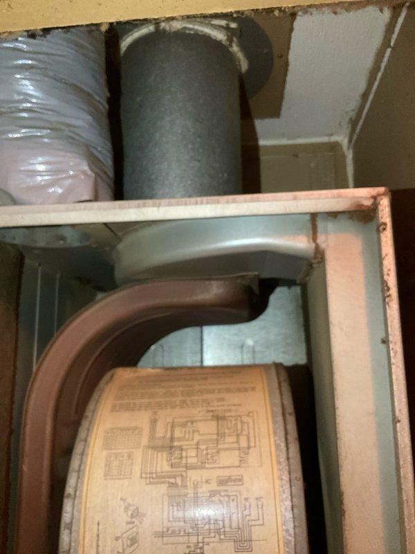 Conducted comprehensive HVAC system evaluation for replacement estimate during evening appointment window. Assessed existing ductwork configuration in mechanical space, including gray cylindrical duct, flexible ducting, and brown curved elbow joint connections. Evaluated electrical panel capacity and circuit breaker configuration to determine compatibility with proposed HVAC equipment replacement. Documented mechanical space layout and existing system components through photographic records. Prepared multiple equipment replacement options addressing single component specifications.