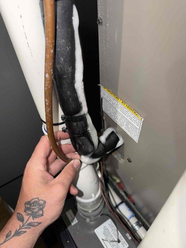 Completed routine maintenance agreement visit for air conditioning system. Inspected air handler unit, refrigerant lines, and condensate drainage system. Observed frost accumulation on suction line indicating proper system operation during cooling mode. Verified all mechanical components, piping connections, and mounting hardware secure and functioning within normal parameters.