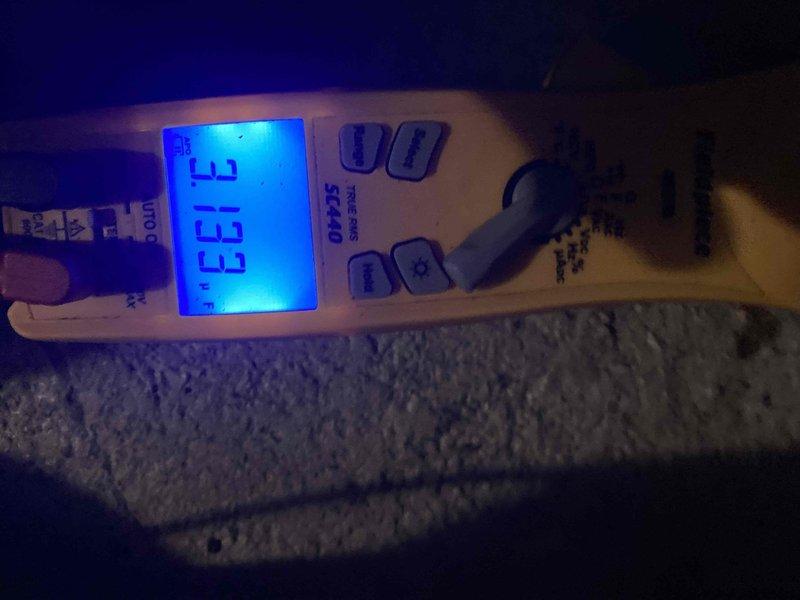 Completed preventive maintenance tune-up on air conditioning system. Performed diagnostic testing using digital multimeter to verify electrical readings at 343V and checked system parameters with handheld gauge displaying normal operating conditions. All measurements confirmed unit operating within manufacturer specifications.