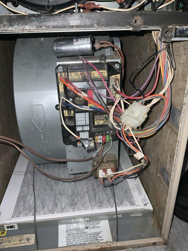 # AC No Cool - Fan Motor Failure

## Summary
Responded to no cooling call on 10+ year old system with non-operational blower fan. Diagnosed failed blower motor and capacitor. Evaporator coil showed extensive corrosion indicating advanced age and moisture exposure throughout unit.

## Work Performed

Upon arrival, confirmed air handler blower motor not operating. Performed diagnostic inspection of indoor unit components. Accessed blower compartment and tested motor capacitor - found failed with no charge. Inspected motor windings and bearings - motor seized and required replacement.

Examined electrical control board mounted to blower assembly. Verified board connections and tested for proper voltage supply. All indicator lights and fuses showed normal operation. Control board functionality confirmed adequate.

Inspected evaporator coil assembly during diagnostic process. Noted heavy rust and corrosion on copper tubing throughout coil serpentine pattern. Corrosion consistent with age-re