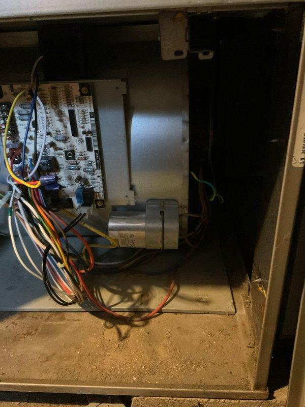 Conducted comprehensive assessment of existing HVAC system experiencing complete refrigerant loss and failing capacitors. Upon inspection, determined unit was not cooling due to weak capacitors and system being completely empty of refrigerant. After evaluating the extent of repairs needed versus system condition, provided detailed replacement estimate for new HVAC equipment. Documented current system configuration, including control board, blower motor assembly, and overall unit condition showing significant dust accumulation and age-related wear. Photographed existing installation in basement mechanical room to support replacement recommendations and ensure proper sizing for new equipment installation.