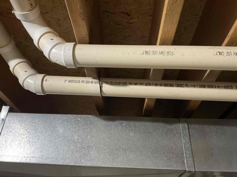 Completed HVAC system assessment for replacement estimate at single-family residence with 13-year-old furnace and 30-year-old air conditioning unit. Evaluated existing air handler installation in basement mechanical room, inspected ductwork routing through attic space including main trunk lines and PVC condensate drainage system, documented current equipment condition and configuration. Provided comprehensive replacement quote including new HVAC system with whole house humidifier integration to meet homeowner's comfort requirements.