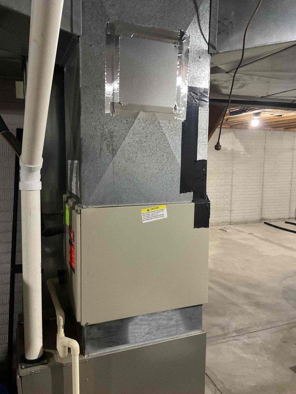 Completed HVAC system assessment for replacement estimate at single-family residence with 13-year-old furnace and 30-year-old air conditioning unit. Evaluated existing air handler installation in basement mechanical room, inspected ductwork routing through attic space including main trunk lines and PVC condensate drainage system, documented current equipment condition and configuration. Provided comprehensive replacement quote including new HVAC system with whole house humidifier integration to meet homeowner's comfort requirements.