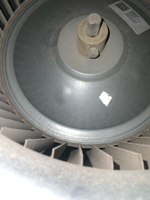 Responded to no cooling complaint with reported humming noise. Upon inspection, found blower motor experiencing mechanical failure causing abnormal operational sounds. Examined blower assembly and control board for related issues. Documented equipment condition including dust accumulation on blower wheel and verified all electrical connections at control board were secure. Recommended blower motor replacement to restore proper system operation and eliminate humming noise.