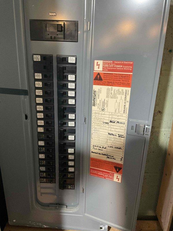 Conducted on-site evaluation for HVAC system replacement in utility area. Documented existing air conditioning unit and air handler equipment, recording manufacturer information, model numbers, and serial numbers from unit nameplates for accurate replacement specifications. Photographed electrical panel configuration showing circuit breaker layout and main disconnect to assess existing electrical infrastructure compatibility with proposed replacement equipment. Inspected installation location conditions including floor space, clearances, and access points in utility closet area. Assessment completed to provide customer with detailed equipment replacement estimate and system upgrade options.